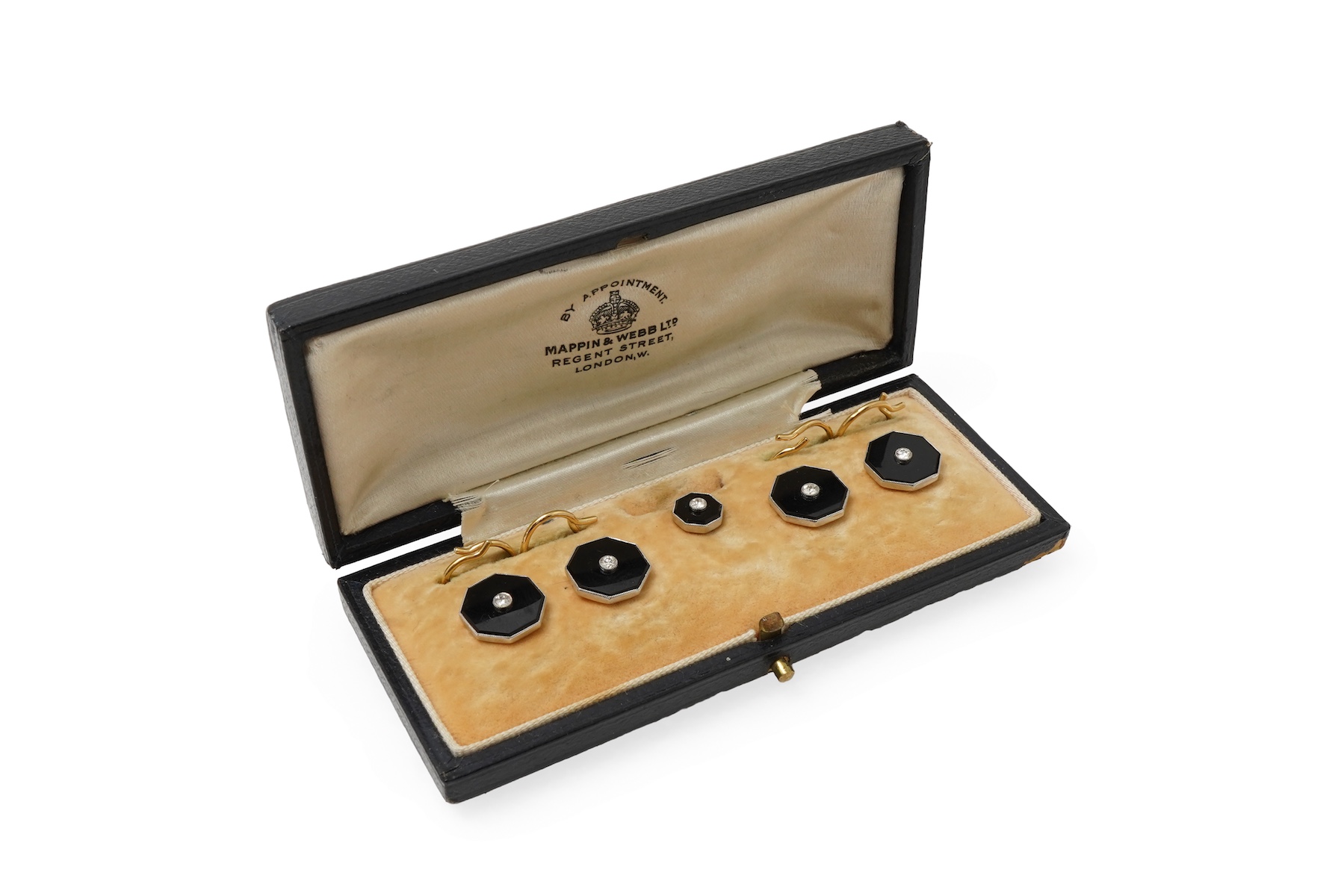 Retailed by Mappin & Webb, an Art Deco onyx and diamond dress set, circa 1920